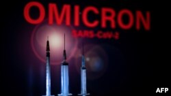 Cartel alertando sobre la necesidad de vacunarse contra variante Ómicron en Toulouse, Francia
