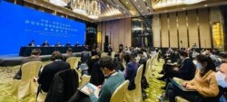 Los científicos de la Organización Mundial de la Salud durante la conferencia de prensa de hoy en Wuhan, China.