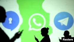 Logos de las apps Signal, Whatsapp y Telegram. REUTERS/Dado Ruvic/Illustration