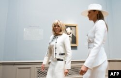 Las primeras damas Melania Trump y Brigitte Macron.